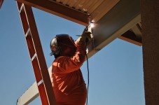 Welder on Ladder